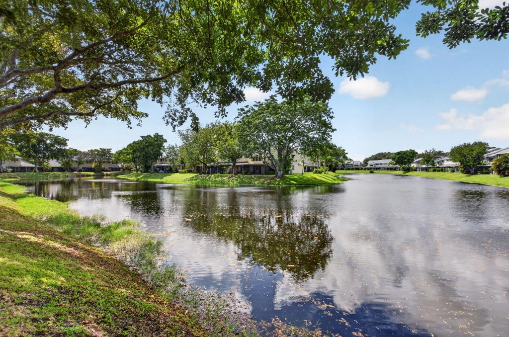 Photo of 1991 Discovery Circle E, Deerfield Beach, FL 33442 (MLS # B26087290)