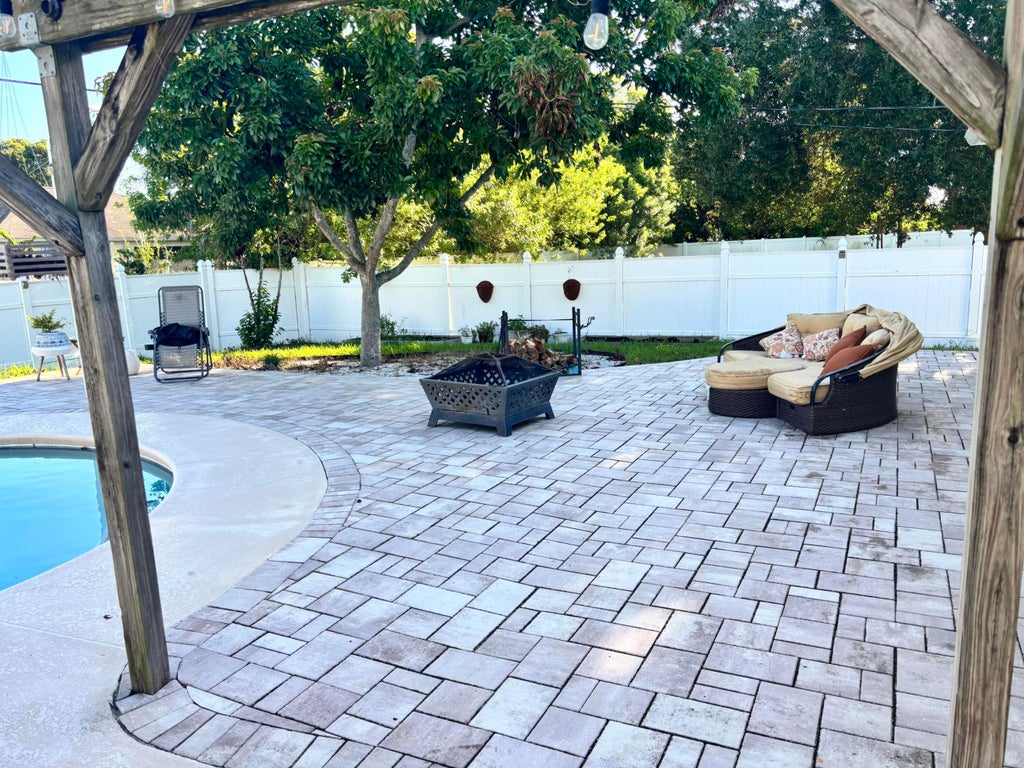 Photo of 527 NW Avon Avenue, Port Saint Lucie, FL 34983 (MLS # B26079148)