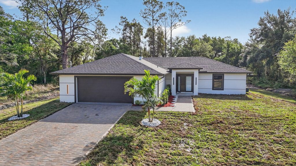 Photo of 1716 Leroy Avenue, Lehigh Acres, FL 33972 (MLS # B26010059)
