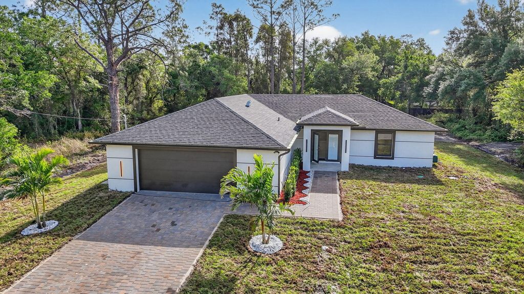 Photo of 1716 Leroy Avenue, Lehigh Acres, FL 33972 (MLS # B26010059)