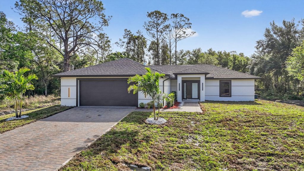 Photo of 1716 Leroy Avenue, Lehigh Acres, FL 33972 (MLS # B26010059)