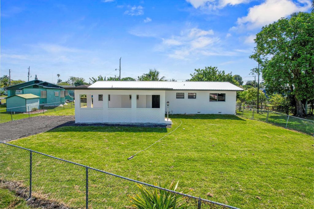 Photo of 615 SE 2nd Street, Belle Glade, FL 33430 (MLS # R10980459)