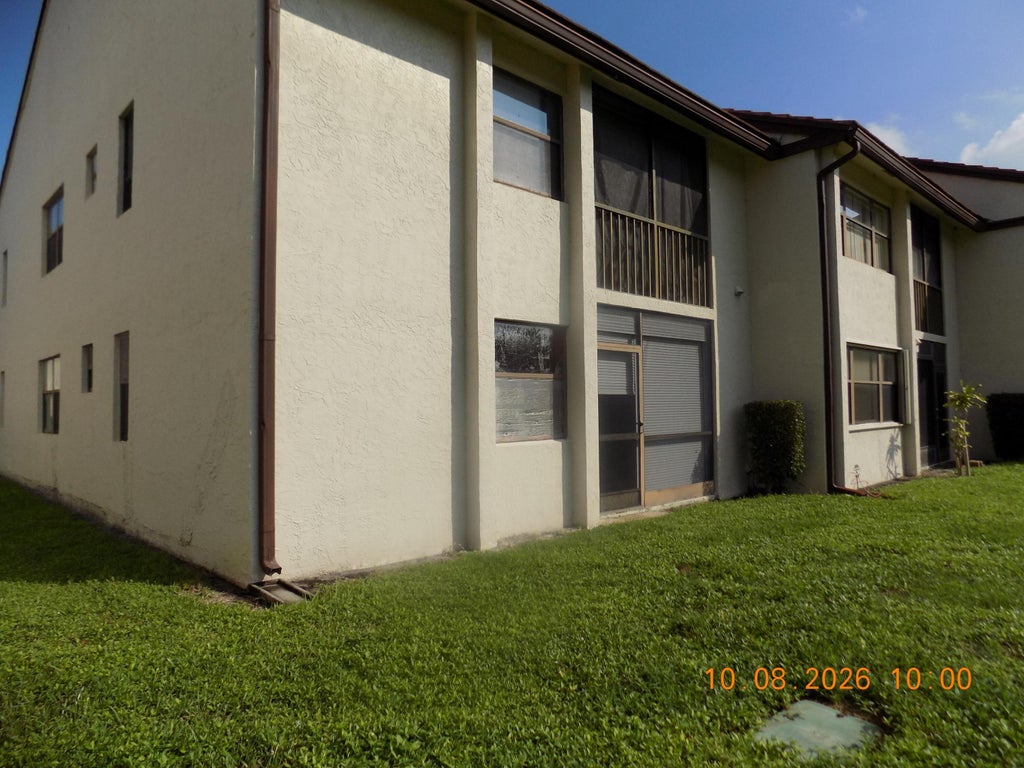Photo of 7674 TAHITI Lane #106, Lake Worth, FL 33467 (MLS # B26086769)