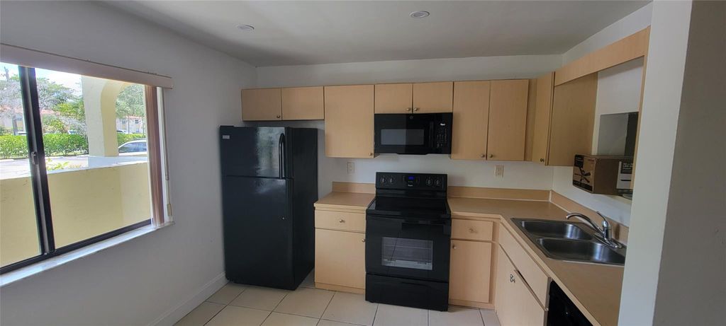 Photo of 11427 Royal Palm Boulevard, Coral Springs, FL 33065 (MLS # F10520746)