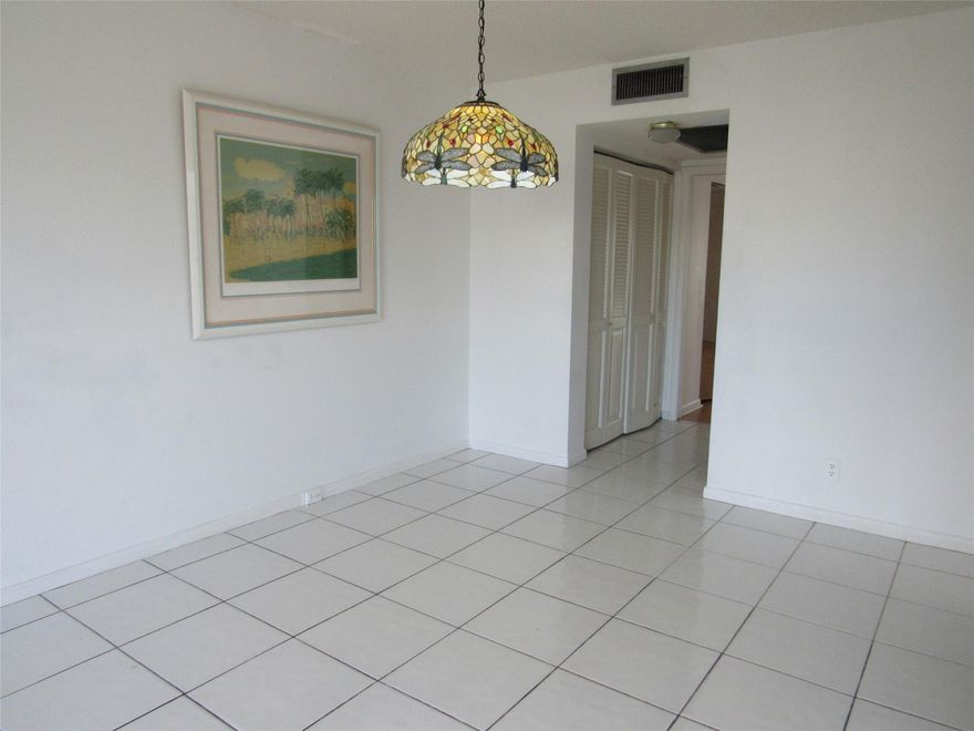 SPARKLING WATER VIEWS IN PRESTIGIOUS CAMBRIDGE C! WALK TO CLUBHOUSE & PLAZA !  TILE IN ALL LIVING AREAS;WOOD LAMINATE IN BEDRM. NEW BATHRM VANITIES & HIGH TOILETS. NEWER WATERHEATER. WALK IN SHOWER FOR YOUR SAFTEY! KITCHEN NEEDS TLC. PRICED TO SELL & MAKE THIS CONDO YOUR OWN! BUILDING HAS LOVELY BBQ AREA BY THE LAKE. 5 STAR CLUBHOUSE W/ CLUBS & CLASSES GALORE! LIVE SHOWS AND WEEKLY MOVIES. STATE OF THE ART GYM W/ FITNESS CLASSES INCLUDING  WEIGHT TRAINING, YOGA, TAI CHI, ZUMBA ETC! PICKLEBALL, TENNIS, 18 POOLS, PING-PONG, BOCCE BALL, PITCH & PUTT, BILLIARDS, 2.5 MILE JOG/BIKE PATH UNDER MATURE TREES. YOU NAME IT WE HAVE IT! GATED COMMUNITY 3.5 MILES FROM SCENIC DEERFIELD BEACH. NO ASSESSMENTS! LOW MAINTENANCE! SELLER WILL CONSIDER ALL REASONABLE OFFERS!