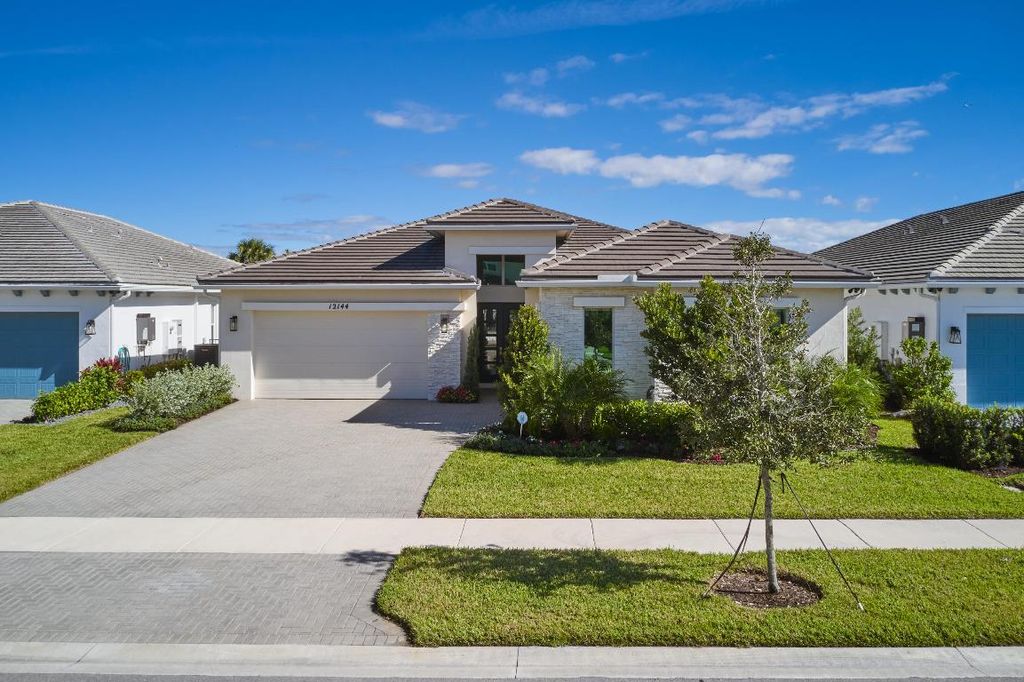 Photo of 12144 Waterstone Circle, Palm Beach Gardens, FL 33412 (MLS # R11144533)