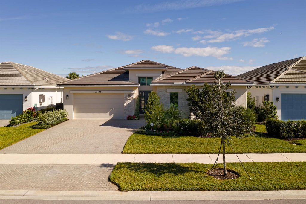 Photo of 12144 Waterstone Circle, Palm Beach Gardens, FL 33412 (MLS # R11144533)