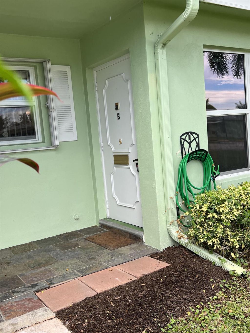 Photo of 211 Country Lane #B, Boynton Beach, FL 33435 (MLS # R10922141)