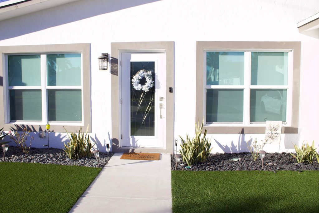 Photo of 517 NW 52nd Street, Boca Raton, FL 33487 (MLS # R11160254)