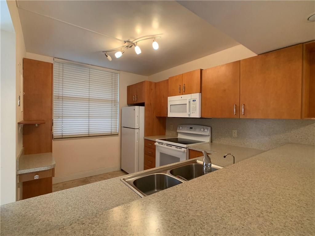 Photo of 1721 Whitehall Drive #102, Davie, FL 33324 (MLS # F10549279)