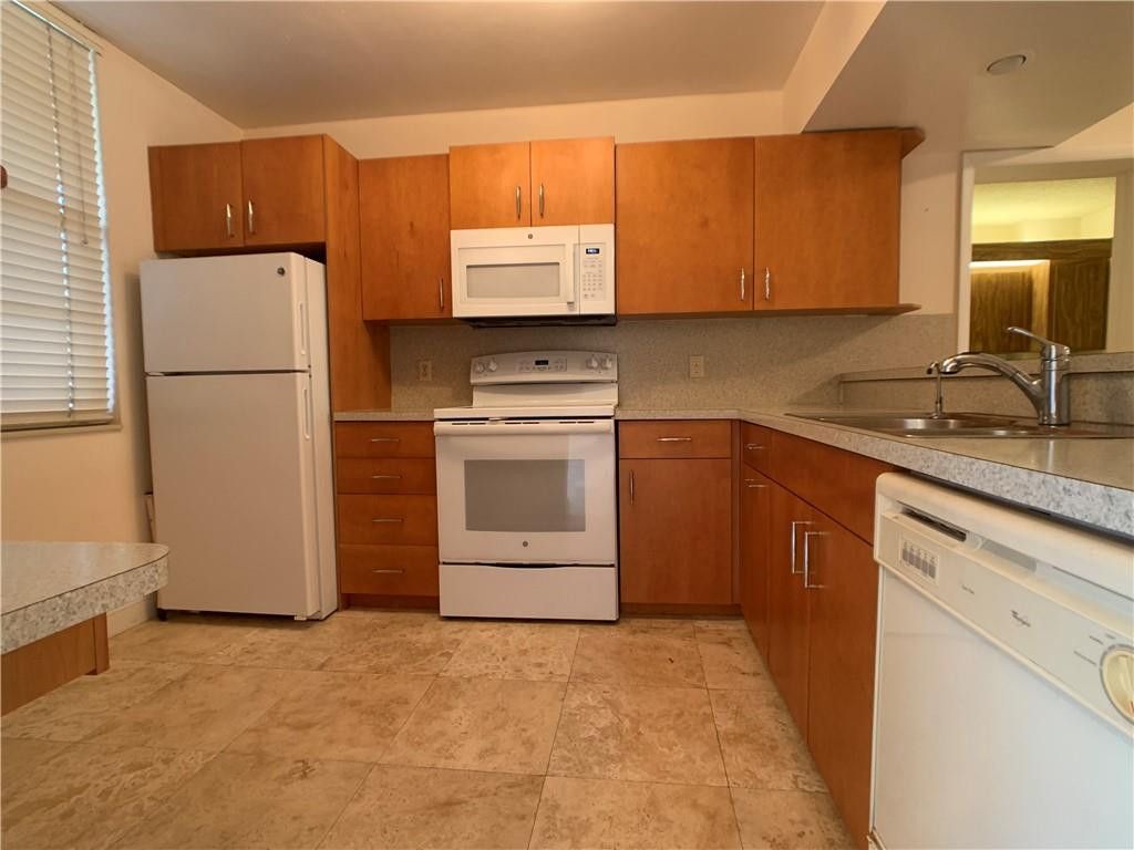 Photo of 1721 Whitehall Drive #102, Davie, FL 33324 (MLS # F10549279)