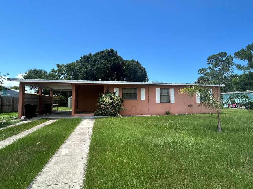 Adorable and updated 2-bedroom concrete block home in the heart of River Park. Enjoy the spacious screened porch, a lovely yard, and an attached carport for added convenience. Nestled on a quiet street, you're just minutes from shopping, dining, and everything Port St. Lucie has to offer. A charming home in a prime location--schedule your showing today!