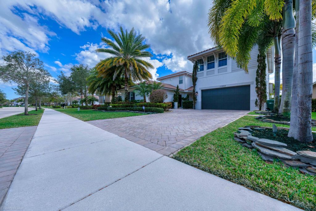 Photo of 11990 NW 81st Court, Parkland, FL 33076 (MLS # R11057419)