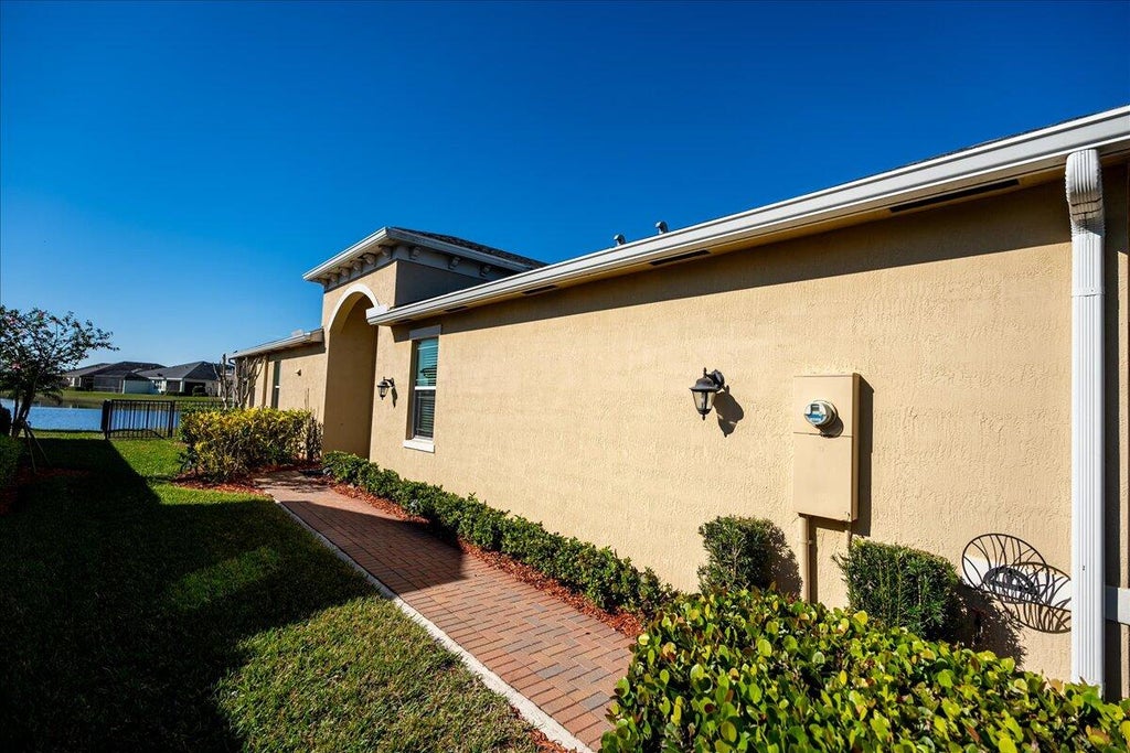Photo of 11520 SW Lake Park Drive, Port Saint Lucie, FL 34987 (MLS # R10955421)
