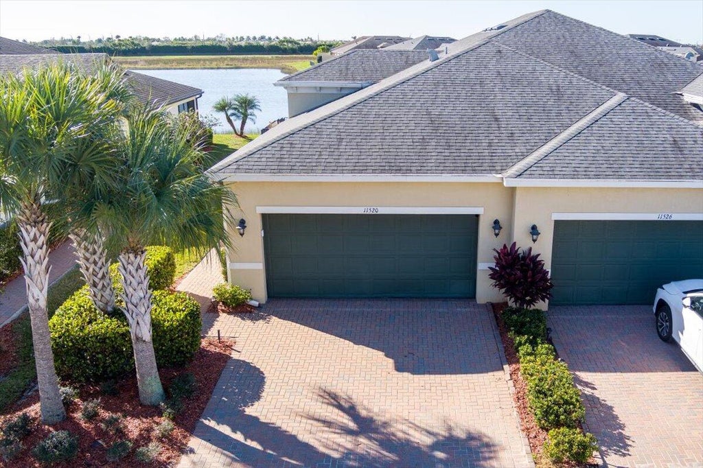 Photo of 11520 SW Lake Park Drive, Port Saint Lucie, FL 34987 (MLS # R10955421)