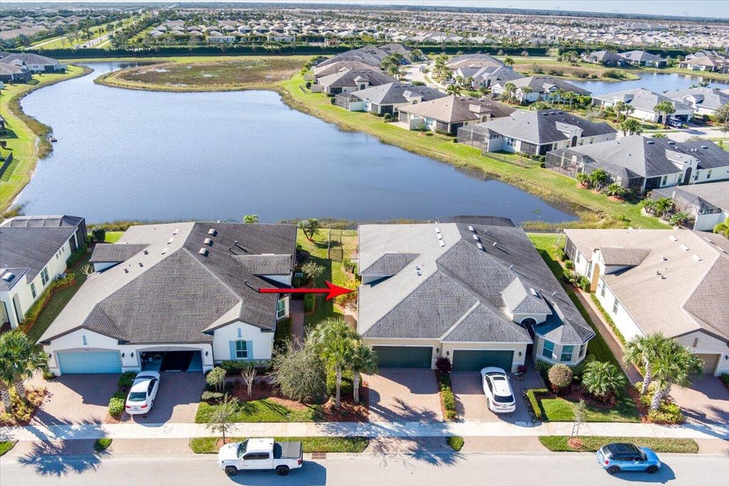 Photo of 11520 SW Lake Park Drive, Port Saint Lucie, FL 34987 (MLS # R10955421)