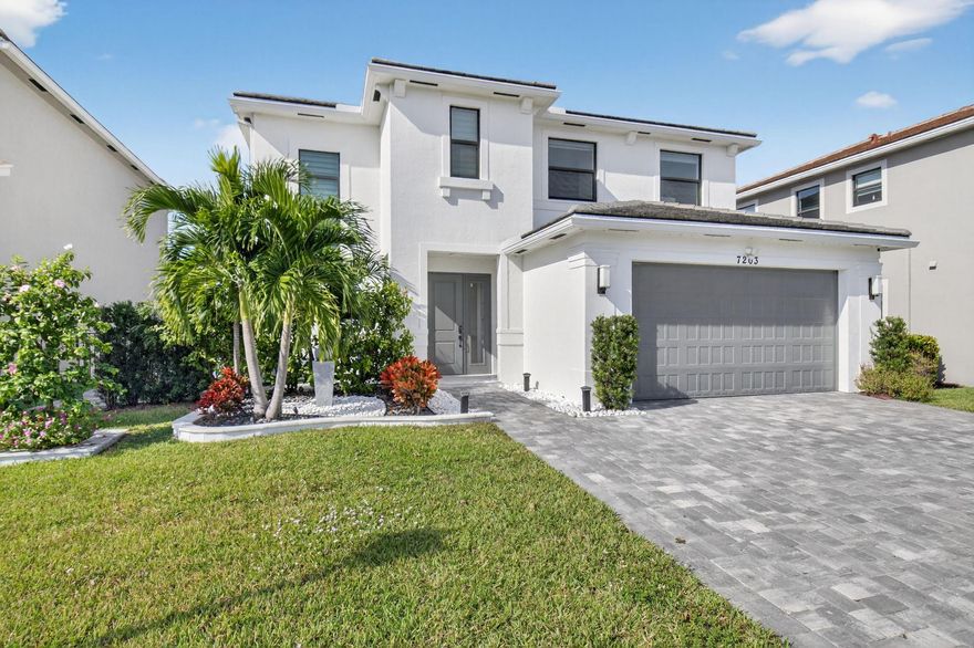 This 2022 new-construction SMART home in a gated Villamar Toscana Isles (Resort Style community) in Lake worth has a truly luxurious feel from the moment you walk in. The owners added nearly $200K in upgrades, and it shows—modern finishes, custom LED lighting, and a beautiful chef-style kitchen that really stands out. The open layout feels bright and inviting, and having a full bedroom and bath on the ground floor is a great bonus for guests or family. Upstairs, the bedrooms are spacious and comfortable. The large covered patio overlooks the peaceful lake, giving you a perfect spot to relax or entertain in style. With a 2-car garage and low HOA, nearby major highways, this home combines everyday comfort with high-end Florida living.