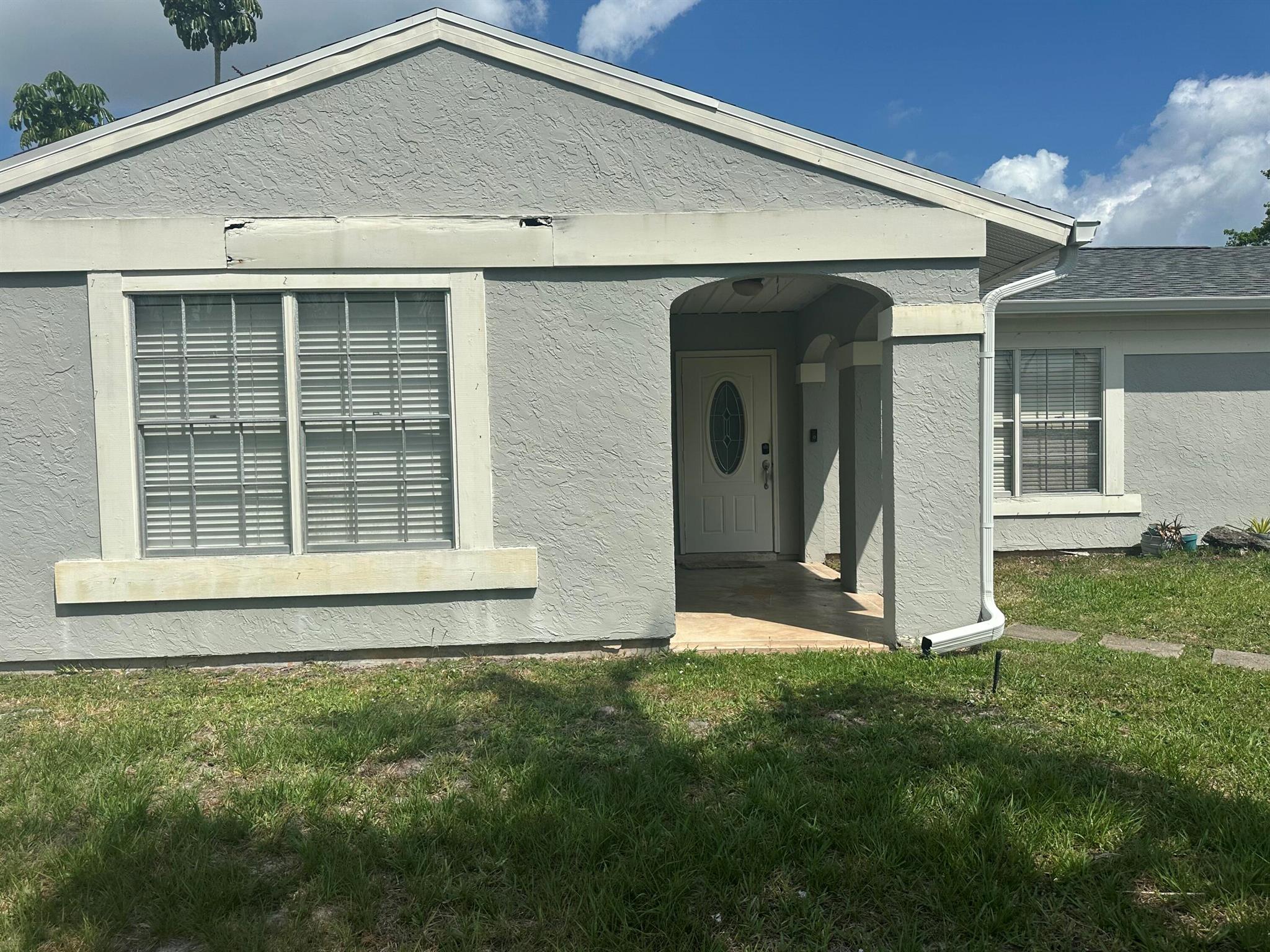 INVESTMENT SPECIAL/FIXER UPPER: COZY 3/2/1/ WITH A NEWER ROOF/2022,. AIR CONDITION-2017, A HUGE SCREEN ROOM-(32'X12') PERMITTED IN 2000-COULD BE ENCLOSED TO ACCOMMODATE A LARGE FAMILY ROOM OR A SMALLER FAMILY ROOM AND A 4TH BEDROOM TO INCREASE VALUE. LOTS OF POTENTIAL! THIS HOME IS OVERFLOWING WITH CURB APPEAL ON A OVER SIZED LOT. NEW SINK, VANITY & NEWER FIXTURES IN THE GUEST BATHROOM. THE BACKYARD HAS PLENTY OF ROOM FOR YOUR POOL. THE PROPERTY HAS NO SPECIAL ASSESSMENTS. PUBLIC WATER AND SEWER. THE PRIMARY BATHROOM HAS BEEN DEMOLISHED AND READY FOR YOUR PERSONAL TOUCHES. SELLERS ARE MOTIVATED BRING ALL CASH OFFERS. CLOSE TO GREAT SCHOOLS, RESTAURANTS, AND SHOPPING.