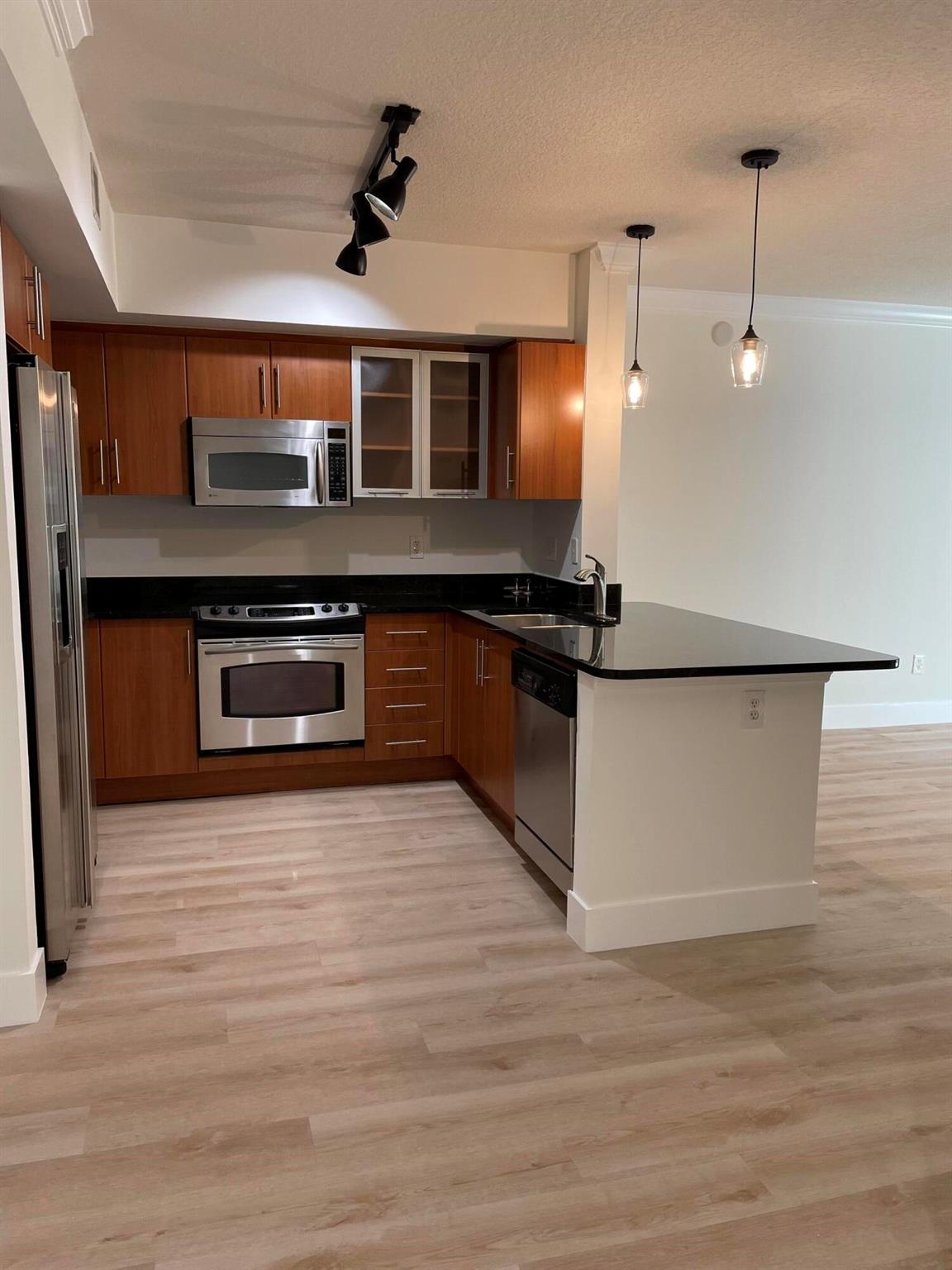 Recently renovated 1/1 with desirable pool deck location boasting an oversized patio area. Light colored wood vinyl plank flooring throughout with updated light fixtures. Updated bathroom vanity with white quartz countertop. Washer/Dryer in the unit. Large walk-in closet in the bedroom. The Prado is ideally located within blocks from everything. 24 hour front desk person, mgmt on site, pool, fitness center and clubroom.