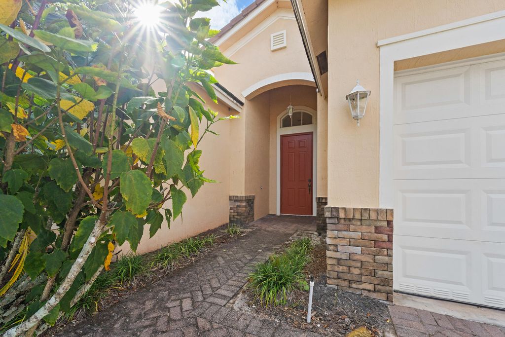 Photo of 10019 SW Chadwick Drive, Port Saint Lucie, FL 34987 (MLS # R11136244)
