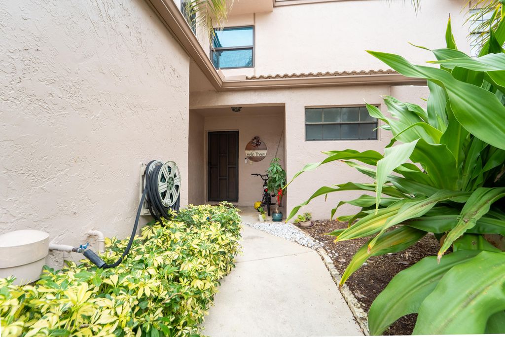 Photo of 1672 Cypress Pointe Drive #1a, Coral Springs, FL 33071 (MLS # R11160508)