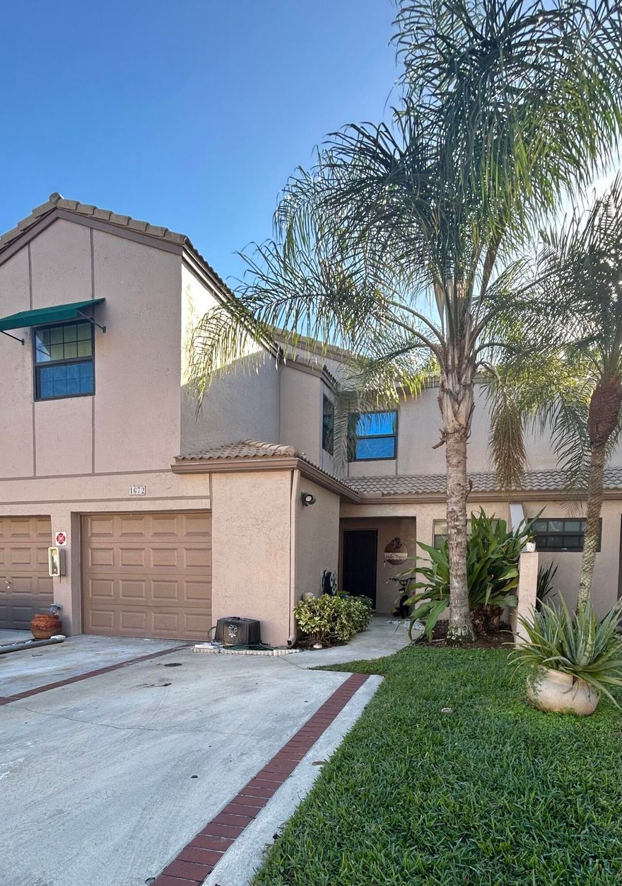 Enjoy stress-free living in this fully remodeled 2/2 first-floor condo in a quiet, well-maintained community. This beautiful unit features a washer/dryer, stainless steel appliances, quartz countertops, a garage with electric car hookup, and two driveway parking spaces. Located just steps from the community pool, this pet-friendly property offers easy, low-maintenance living. The responsive HOA includes roof and exterior maintenance, building insurance, lawn care, water, sewer, trash, and well-funded reserves. The community has passed its 40-year inspection, offering peace of mind. This beautiful enclave is close to parks, pickleball, tennis, shopping, dining, top-rated hospitals, golf courses, and the Coral Springs Center for the Arts. Comfort and convenience await. Make it yours today!