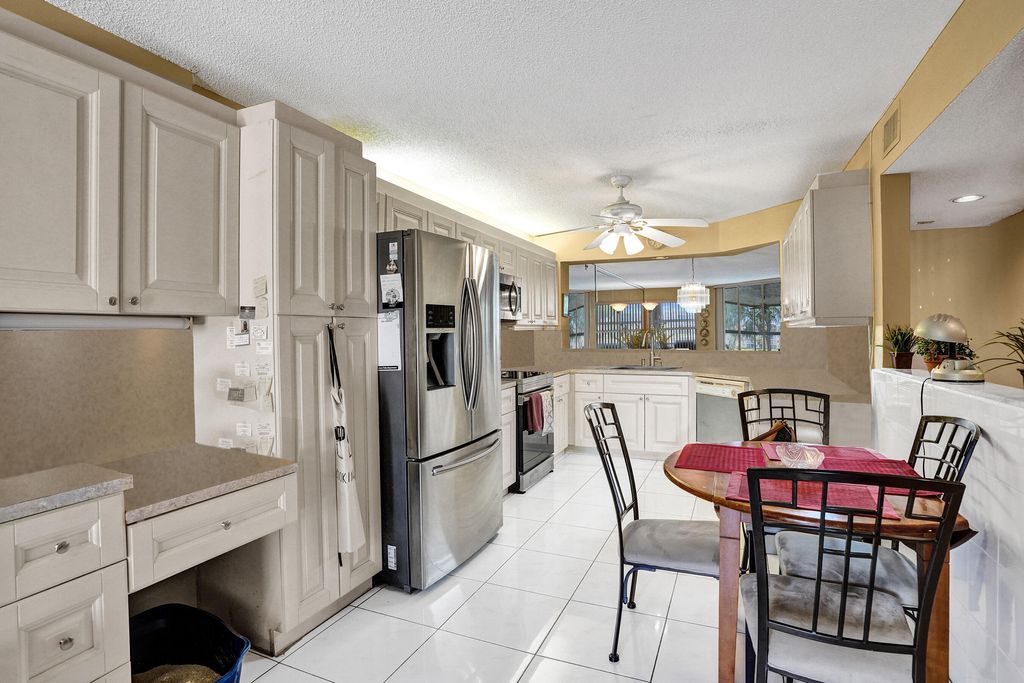 Photo of 7609 Granville Drive #105, Tamarac, FL 33321 (MLS # B26027069)