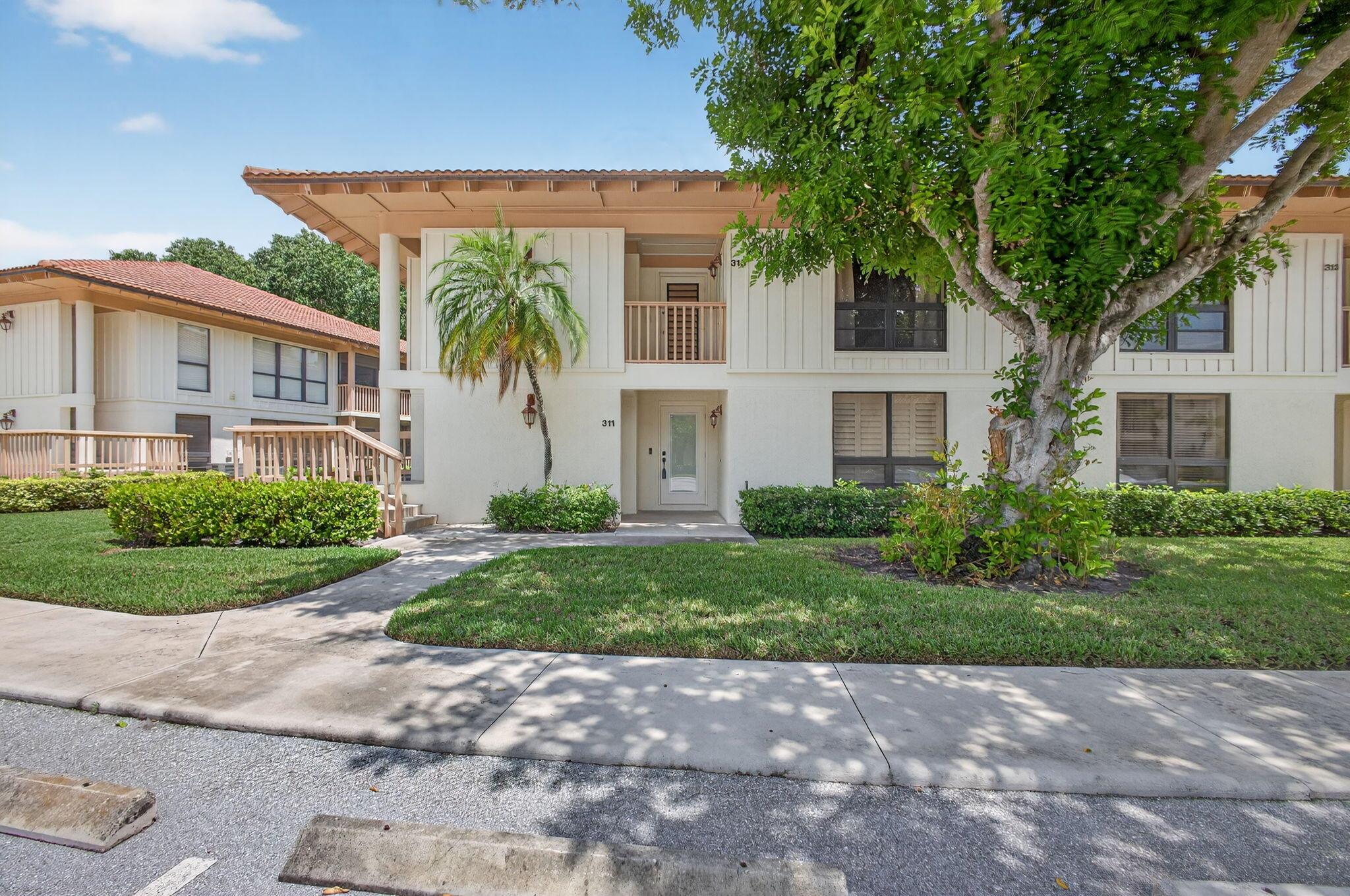 Enjoy effortless living in this beautifully remodeled 2-bedroom, 2-bathroom condo located in the sought-after Golf Villas community of PGA National. This spacious 1,366 sq. ft. first-floor, corner unit offers a bright, open layout and stylish upgrades throughout--perfectly move-in ready.Upon walking in you are greeted with an updated kitchen with modern finishes and stainless steel appliances, plantation shutters, and all-new flooring throughout. The primary suite includes a beautifully renovated en-suite bath. In-unit washer and dryer are less than a year old for your comfort and convenience. Enjoy two community pools and the exceptional lifestyle PGA National offers. Perfect as a full-time home, seasonal retreat, or investment opportunity!