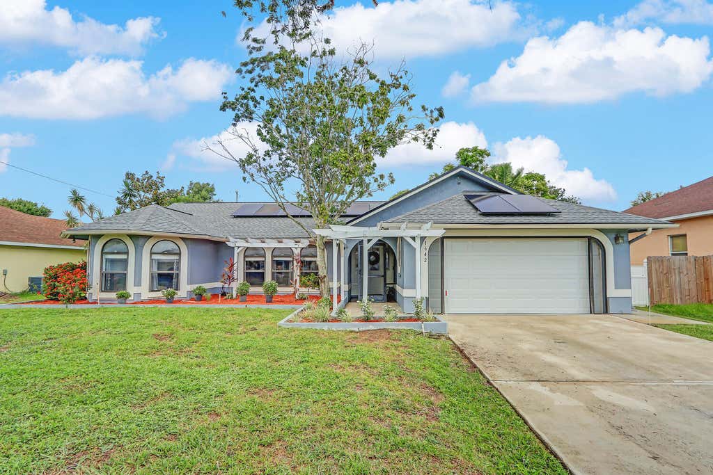 Photo of 1642 SW Realty Street, Port Saint Lucie, FL 34987 (MLS # R11018967)