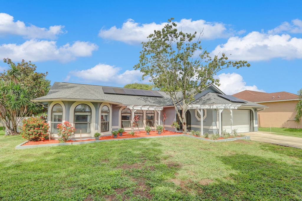 Photo of 1642 SW Realty Street, Port Saint Lucie, FL 34987 (MLS # R11018967)