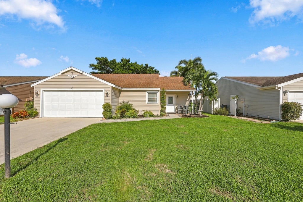 Photo of 5215 Canal Circle W, Lake Worth, FL 33467 (MLS # B26093222)