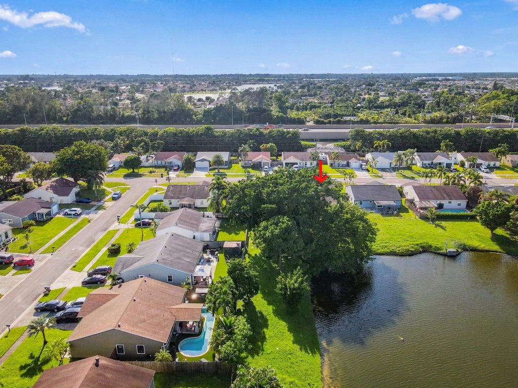 Photo of 5215 Canal Circle W, Lake Worth, FL 33467 (MLS # B26093222)
