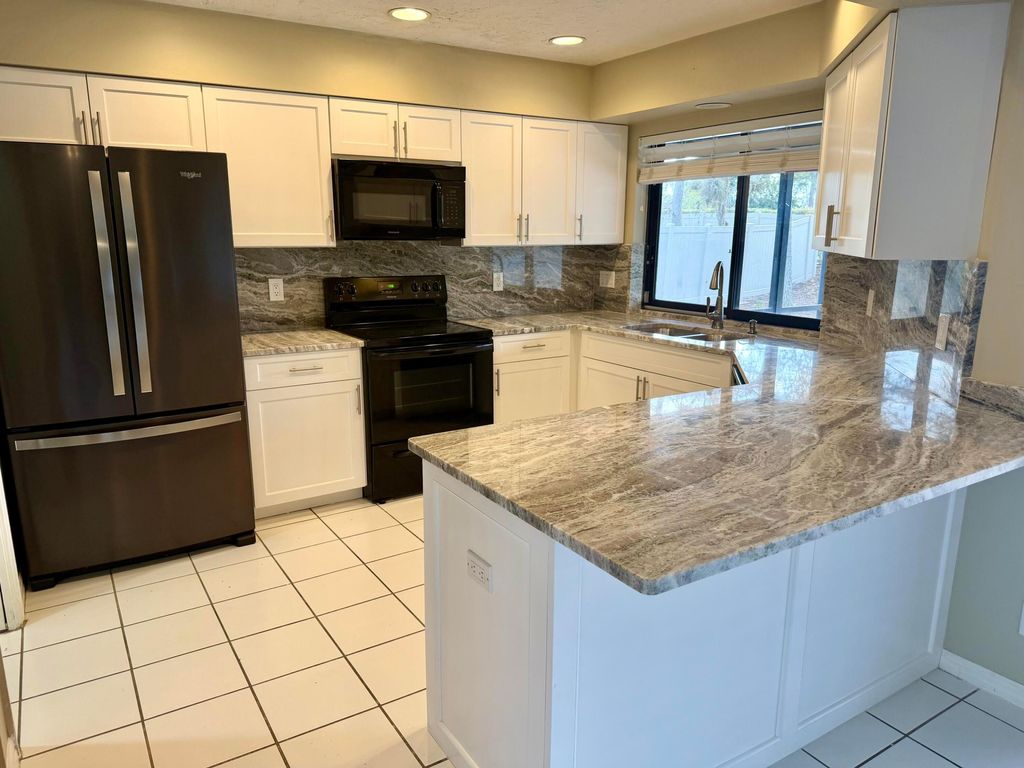 Photo of 13427 Kingsbury Drive, Wellington, FL 33414 (MLS # R11167504)