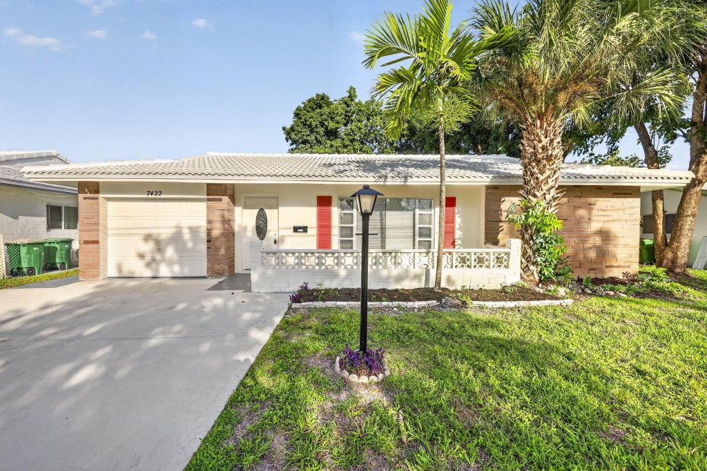 Photo of 7422 NW 70TH Avenue, Tamarac, FL 33321 (MLS # B26087111)