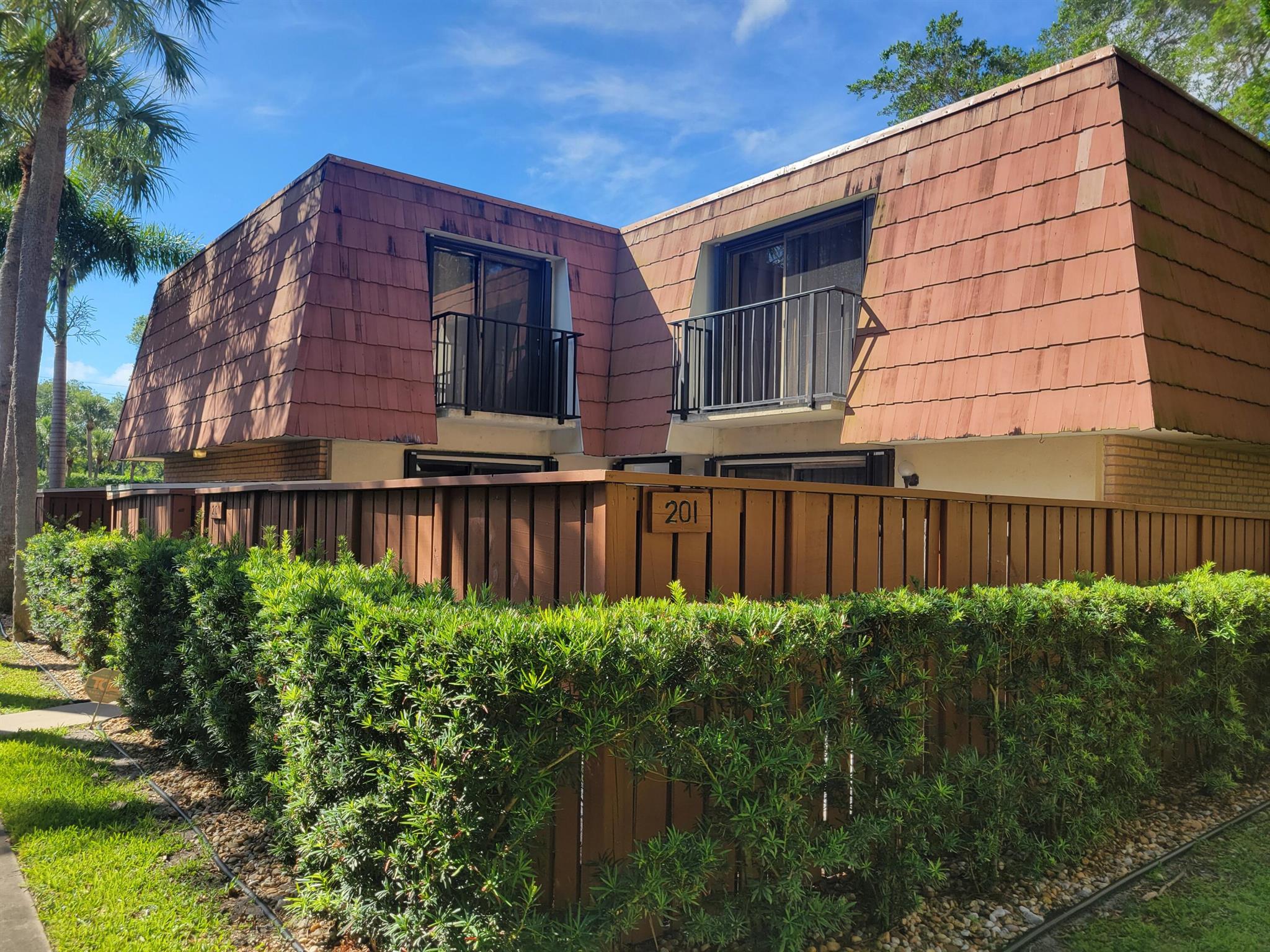 Nice clean, ready to move in. updated kitchen and baths, fenced in courtyard Two designated parking spaces large community pool. Close to shopping, schools and I95