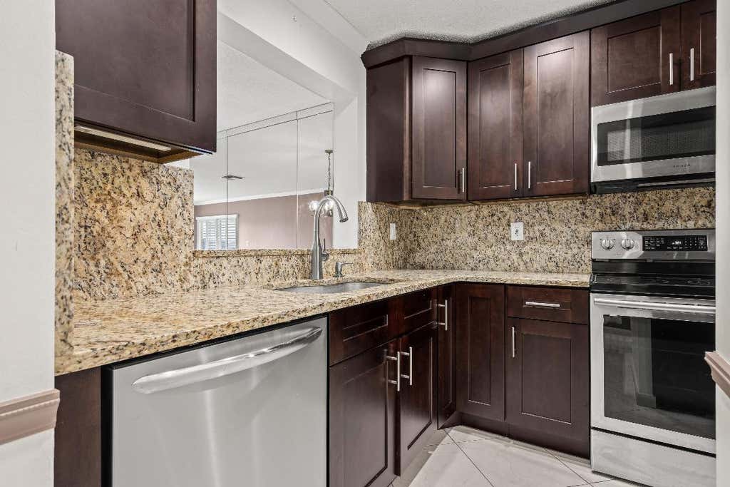 Photo of 5820 Sugar Palm Court #D, Delray Beach, FL 33484 (MLS # R11080832)