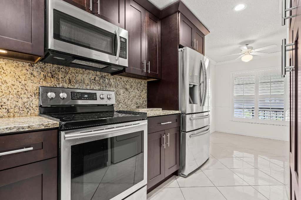 Photo of 5820 Sugar Palm Court #D, Delray Beach, FL 33484 (MLS # R11080832)