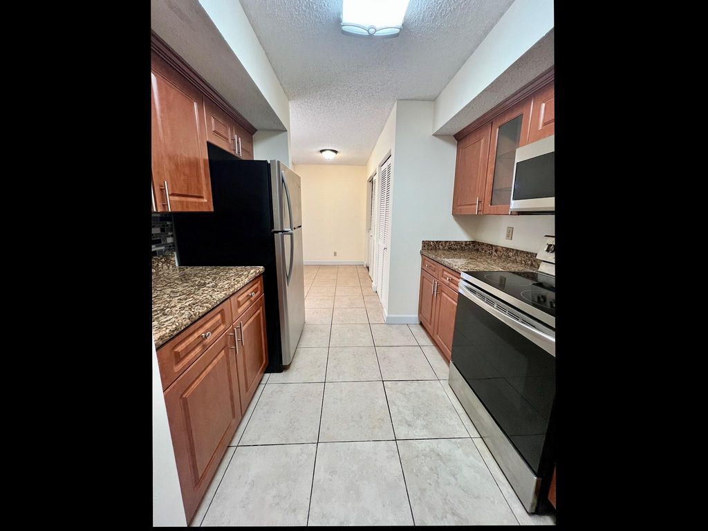 Photo of 8266 NW 24th Street #8266, Coral Springs, FL 33065 (MLS # B26014041)