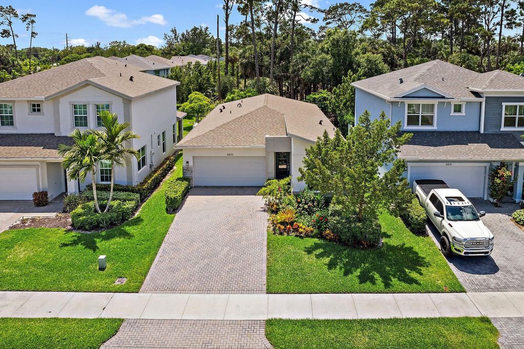 Photo of 6825 Pointe Of Woods Drive, West Palm Beach, FL 33413 (MLS # R11097451)
