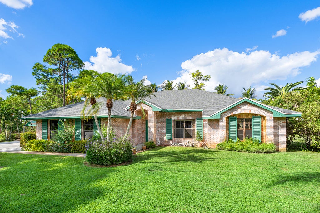 Photo of 13677 Citrus Grove Boulevard, West Palm Beach, FL 33412 (MLS # B26092516)