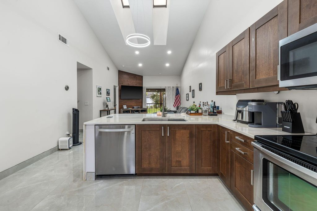 Photo of 600 Crosswinds Drive #C2, Greenacres, FL 33413 (MLS # R11168619)