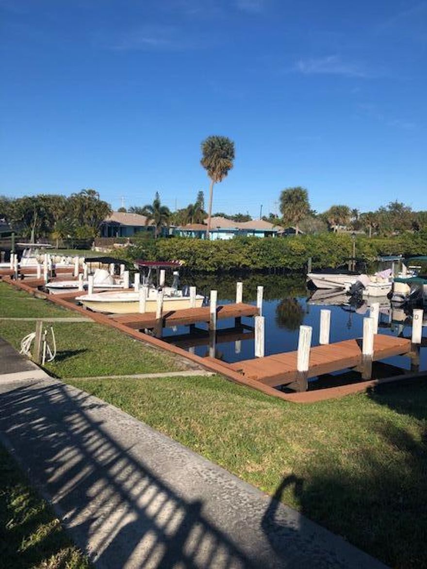 Diamond in the rough.  Spacious 2nd floor condo in 55+ community with 1,273 sq ft.
Do a lot or a little to make this your winter retreat or permanent home.  Great community with marina for boats up to 21.5' and a boat storage yard.  large heated community pool, tennis and pickle ball courts.  Large Clubhouse with  community room with kitchen.  Sauna and billiard's. Close to the waterfront and all kinds of shopping and dining. One pet allowed, covered parking and owners storage locker.  This won't last.....