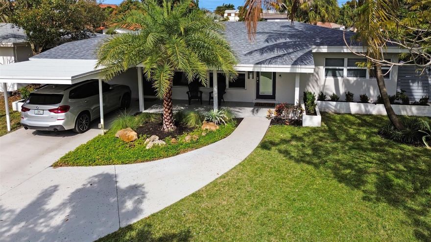 Welcome to this stunning remodeled single-family home located on a large corner lot. This property features 3 bedrooms, 2 updated baths and an updated large kitchen with an open floor plan to the living space. Kitchen has plenty of shaker cabinets, quartz counter tops with large island, and Samsung stove, refrigerator, and dishwasher. The primary bedroom offers a large shower and double vanity with access to the salt water pool & spa through the sliding doors. One of the guest bedrooms also has access to the pool through a sliding door. Step outside to a new pool & spa with plenty of outdoor space to enjoy South Florida's warm weather. Updated HVAC, roof, plumbing, electric, impact windows and doors for your worry-free home.