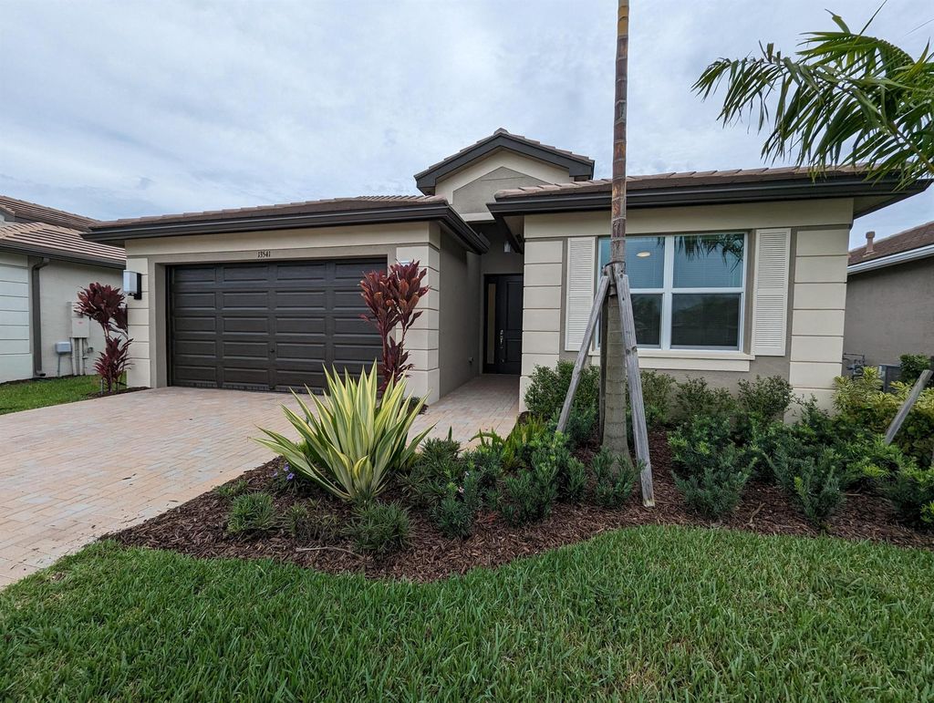 Photo of 13541 SW Oceanus Boulevard, Port Saint Lucie, FL 34987 (MLS # R10983255)