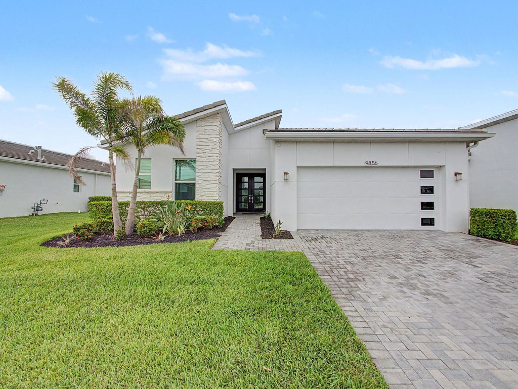 Photo of 9856 SW Isabelline Drive, Port Saint Lucie, FL 34987 (MLS # B26031715)