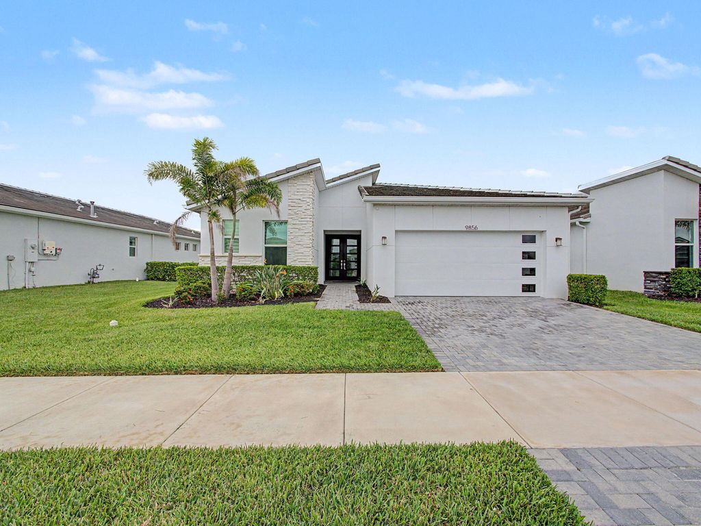 Photo of 9856 SW Isabelline Drive, Port Saint Lucie, FL 34987 (MLS # B26031715)