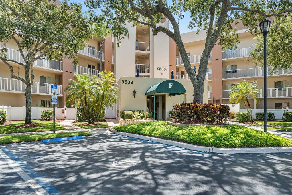 Photo of 9539 WELDON Circle #F408, Tamarac, FL 33321 (MLS # B26064047)