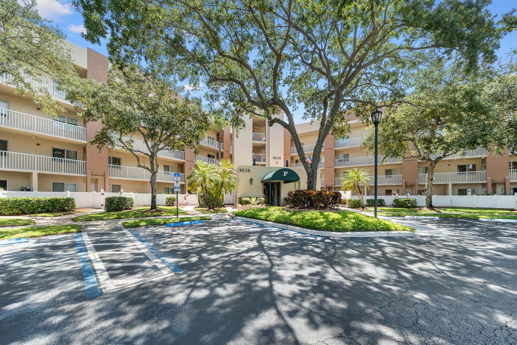 Photo of 9539 WELDON Circle #F408, Tamarac, FL 33321 (MLS # B26064047)