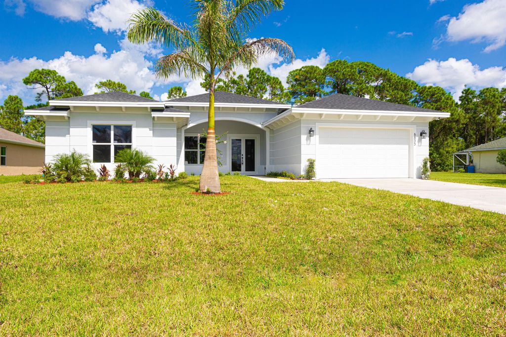 Photo of 5833 NW Wesley Road, Port Saint Lucie, FL 34986 (MLS # R10926284)