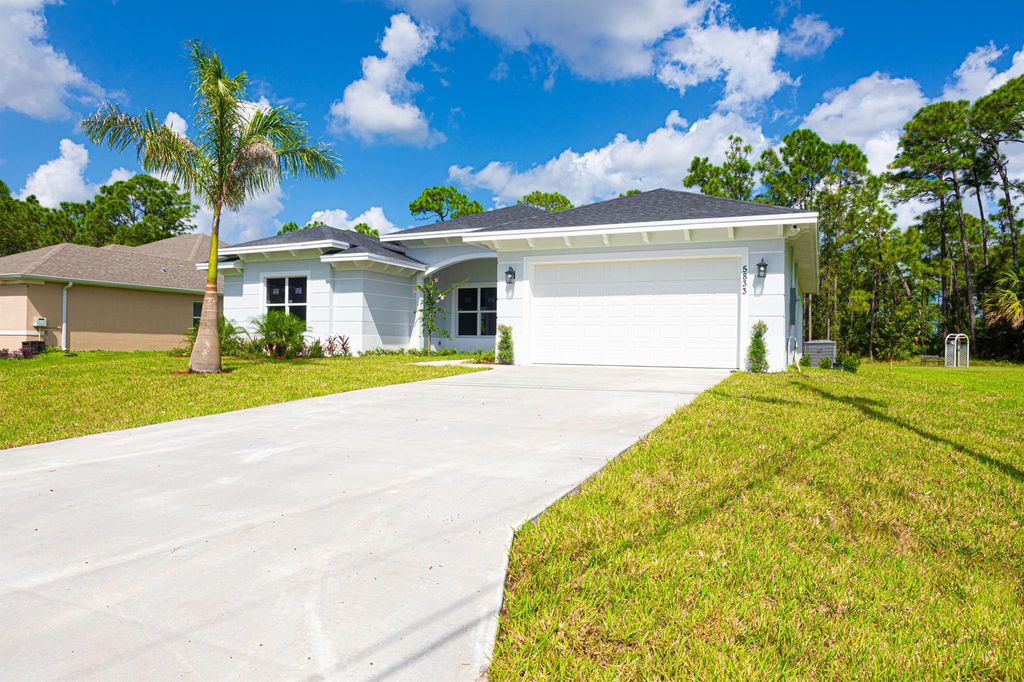 Photo of 5833 NW Wesley Road, Port Saint Lucie, FL 34986 (MLS # R10926284)